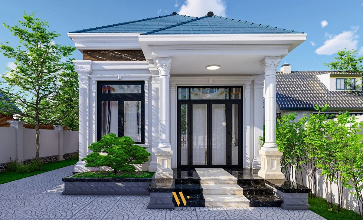 Mẫu nhà cấp 4 đẹp mái Thái màu trắng với cột trang trí và sân lát đá
