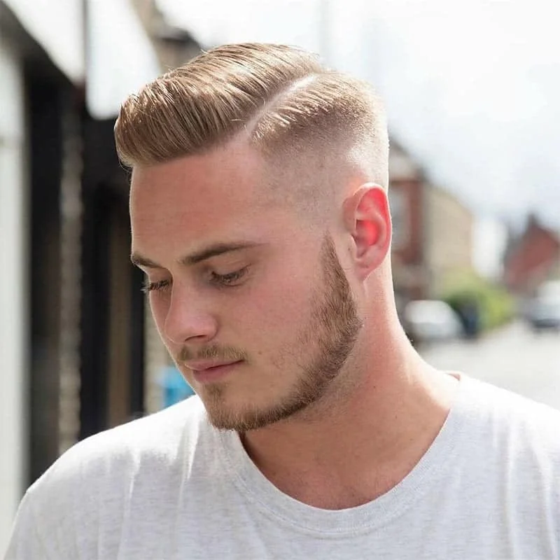 Kiểu tóc nam đẹp với phong cách side part fade hiện đại và cá tính.